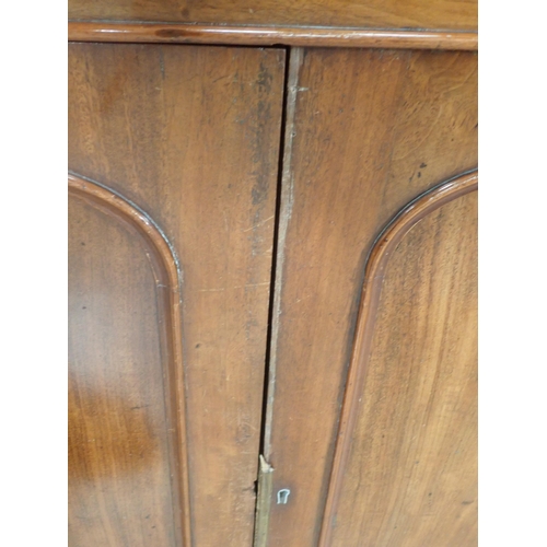 393 - A 19th Century mahogany Bookcase fitted pair of glazed cupboard doors above base fitted pair of pane... 