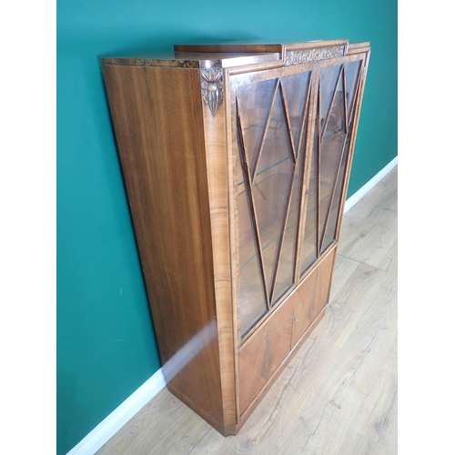 45 - An Art Deco walnut veneered and glazed two door Display Cabinet fitted two doors to base 4ft 8in H x... 