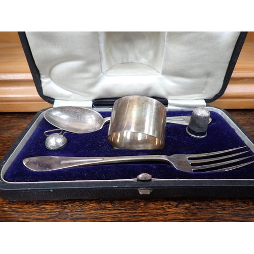 496 - A cased silver Christening Set comprising of Forks, Spoon and a Napkin Ring, plated Condiment Set, a... 