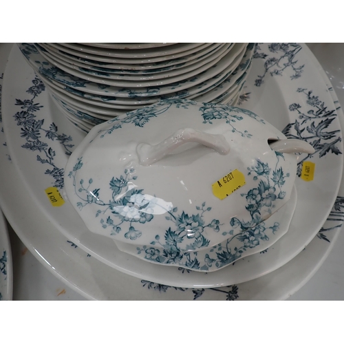 529 - A floral patterned transfer printed part Dinner Service including Tureens and oval Meat Dishes and t... 