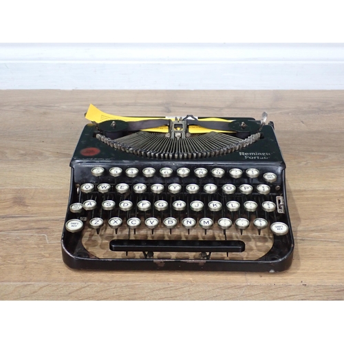 571 - A Remington Portable Typewriter c.1924, Serial No. NX40048. This was the first four-row keyboard por... 