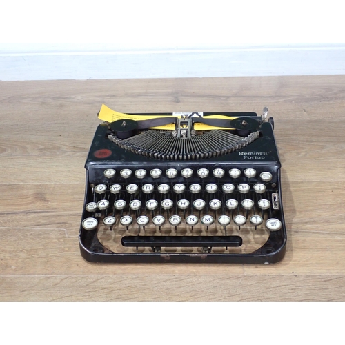 571 - A Remington Portable Typewriter c.1924, Serial No. NX40048. This was the first four-row keyboard por... 