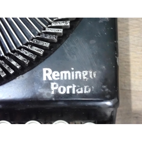 571 - A Remington Portable Typewriter c.1924, Serial No. NX40048. This was the first four-row keyboard por... 