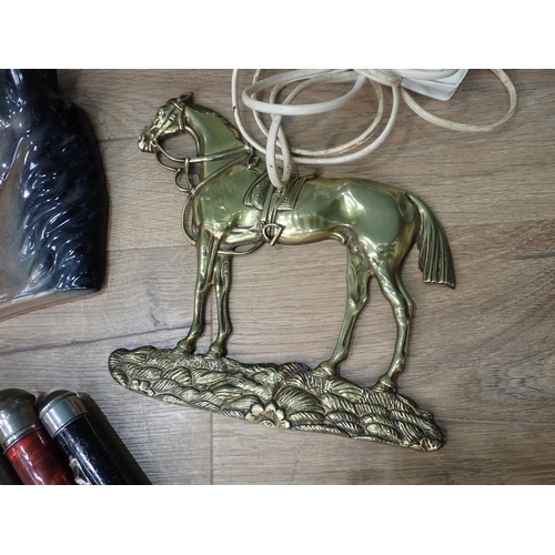 579 - A glass Pistol Ornament, brass Horses, ceramic Horse Mask, glass Buddha, a mermaid Table Lamp, Glen ... 