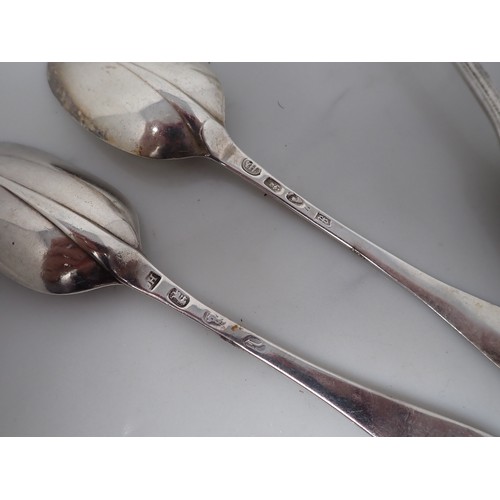 148 - Two 18th Century Britannia standard silver Table Spoons with rat tail bowls, engraved crests, anothe... 