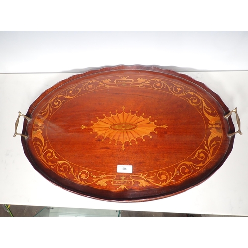 586 - A 19th Century mahogany and satinwood inlaid oval Tray 2ft 3in W