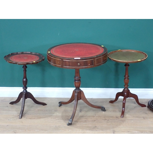 59 - A mahogany veneered Drum Table, two reproduction Wine Tables and an oak barley twist Standard Lamp