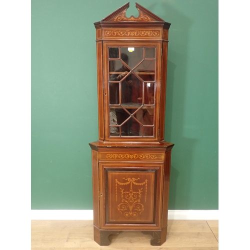 597 - An Edwardian mahogany and inlaid standing Corner Cabinet with broken arch pediment above astragal gl... 