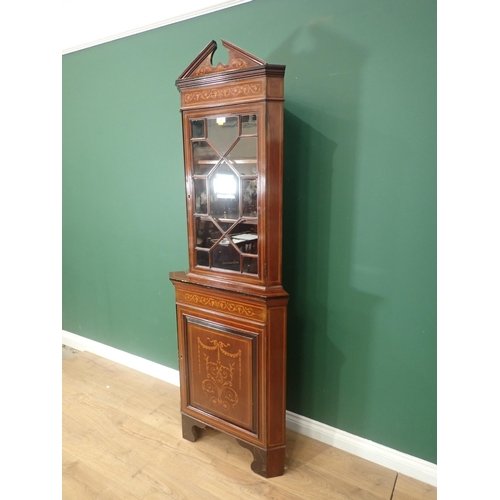 597 - An Edwardian mahogany and inlaid standing Corner Cabinet with broken arch pediment above astragal gl... 