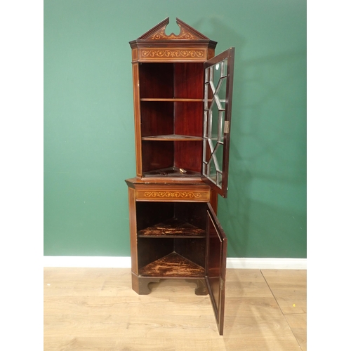 597 - An Edwardian mahogany and inlaid standing Corner Cabinet with broken arch pediment above astragal gl... 