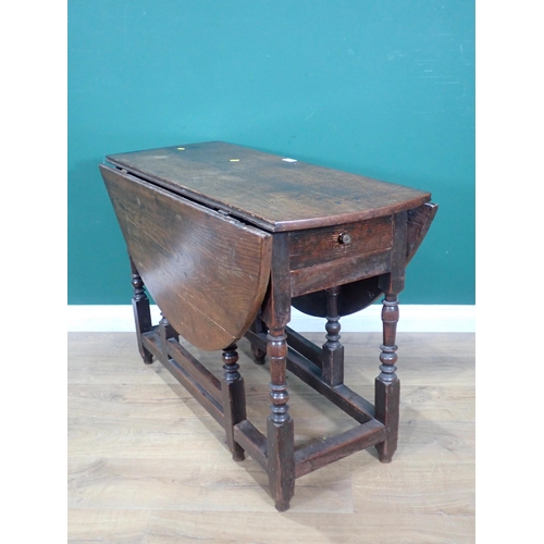 603 - An 18th Century oak Gateleg Table fitted end drawer mounted upon turned supports 3ft 4in W x 2ft 4in... 