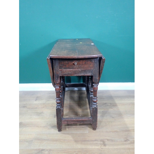 603 - An 18th Century oak Gateleg Table fitted end drawer mounted upon turned supports 3ft 4in W x 2ft 4in... 