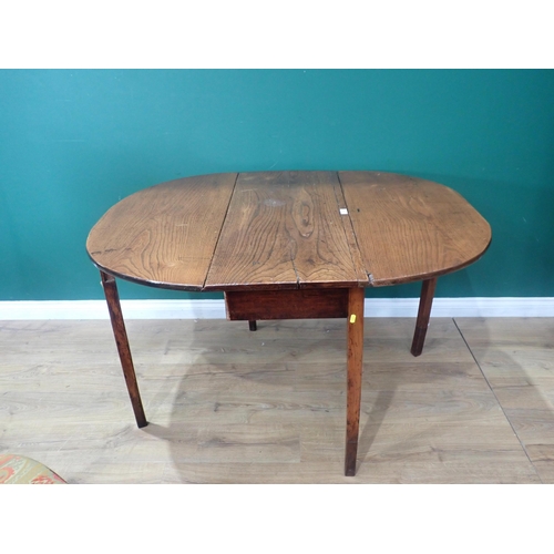 623 - An antique elm Pembroke Table raised on squared tapering supports, 3ft 5in, legs repaired