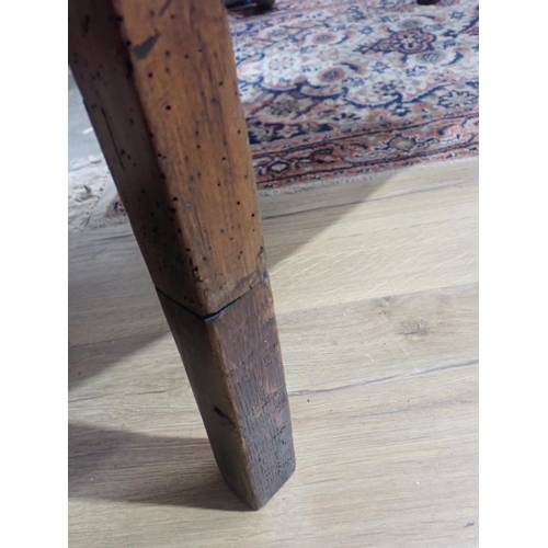 623 - An antique elm Pembroke Table raised on squared tapering supports, 3ft 5in, legs repaired