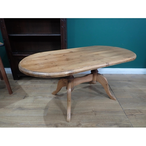 650 - An Ercol style Bookcase, a pine Coffee Table and a melamine Coffee Table