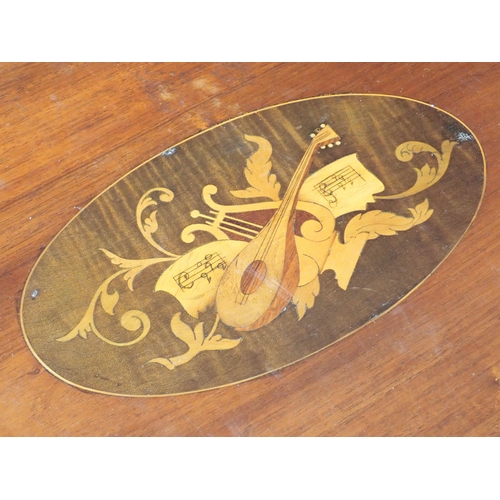 656 - A 19th Century oval mahogany Tray with satinwood musical instrument inlay and crossbanding 2ft 3in W