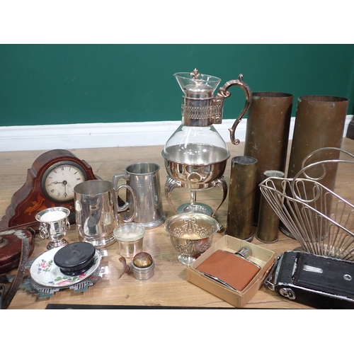 665 - A box containing a glass Ewer on plated stand, two brass Shell Cases, two old Cameras, Surveyor's Me... 