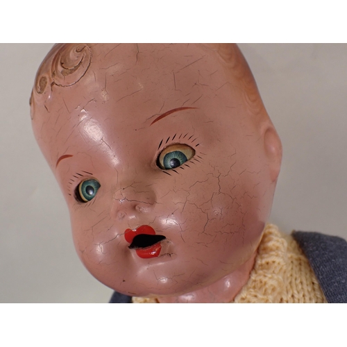 67 - Five composition or celluloid Dolls