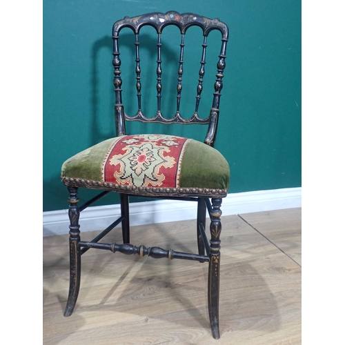 673 - An ebonised Elbow Chair and a Victorian ebonised, painted Single Chair and an oak framed leather Fir... 