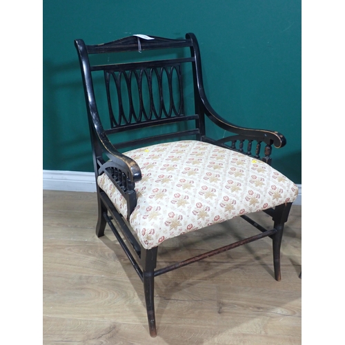 673 - An ebonised Elbow Chair and a Victorian ebonised, painted Single Chair and an oak framed leather Fir... 