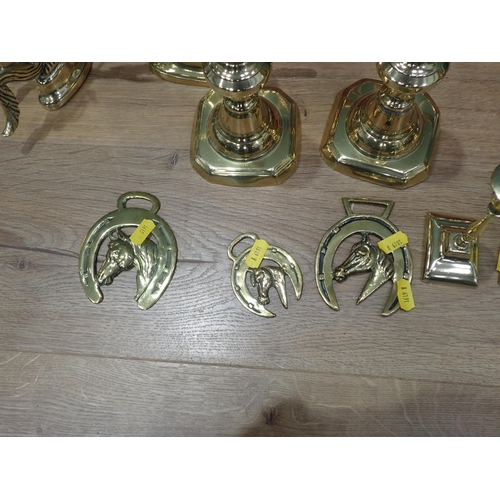 693 - A quantity of brass and silver plated Candle Sticks, two copper Coal Scuttles, two copper Kettles an... 