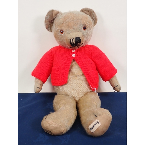 70 - An old jointed Teddy Bear with amber and glass eyes, 20in, repaired and worn and three old Teddy Bea... 