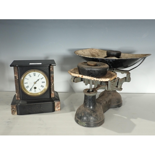 733 - A black marble Mantel Clock and a set of Scales and weights