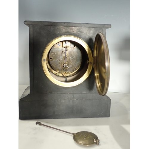 733 - A black marble Mantel Clock and a set of Scales and weights