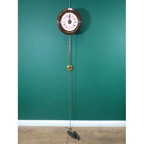 740 - A circular Wall Clock with pine cone weights