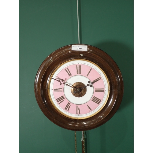 740 - A circular Wall Clock with pine cone weights