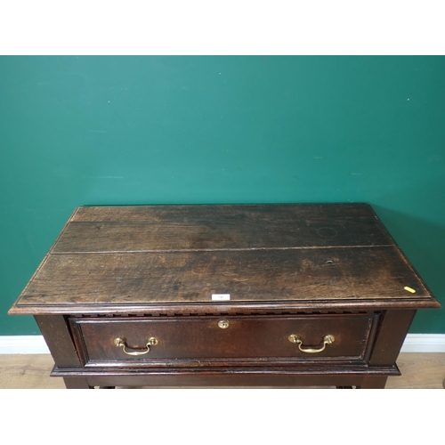 741 - An oak Side Table in the 17th Century style fitted single deep drawers mounted upon turned supports ... 