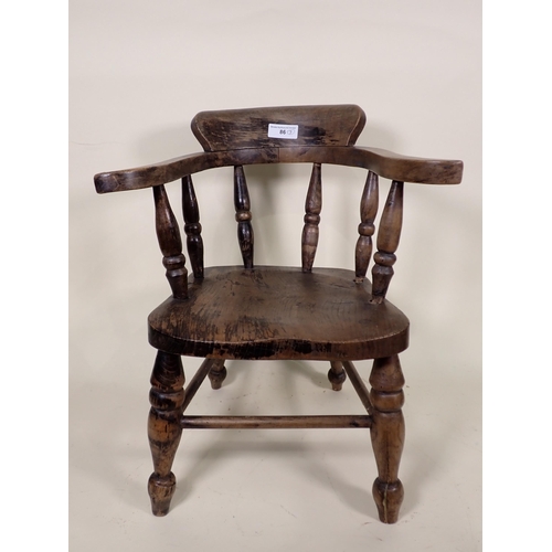 86 - A Doll's/Child's Captain's Chair, an elm Commode Elbow Chair and another with spindle back