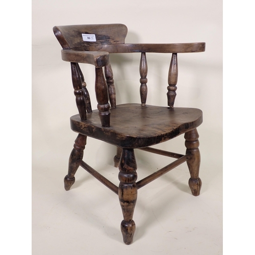 86 - A Doll's/Child's Captain's Chair, an elm Commode Elbow Chair and another with spindle back