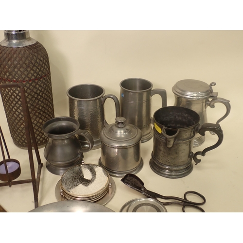 584 - Five pewter Tankards, four branch Candelabra, Soda Dispenser, Plate, brass framed Wall Mirror with c... 