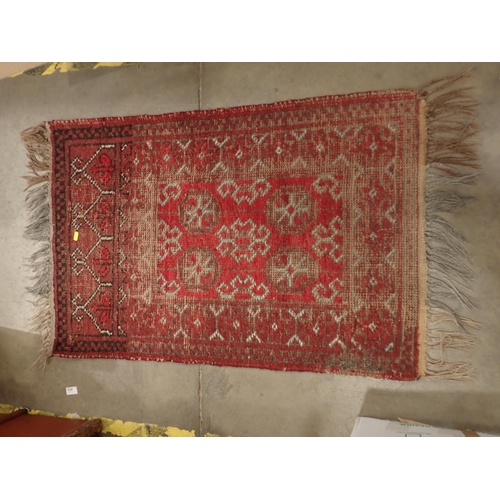 608 - A red ground woollen Rug 3ft 6in L x 2ft 2in W, an oak cased Mantle Clock, gilt framed Mirror and Pi... 