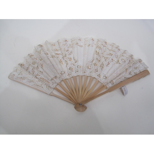 404 - A painted Fan, incorporating mother of pearl supports, length 14in; together with two other Fans; an... 