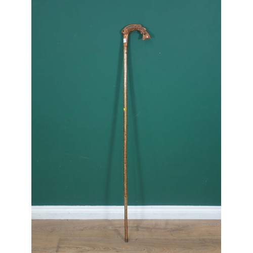 581 - A hazel Walking Stick with carved salmon handle