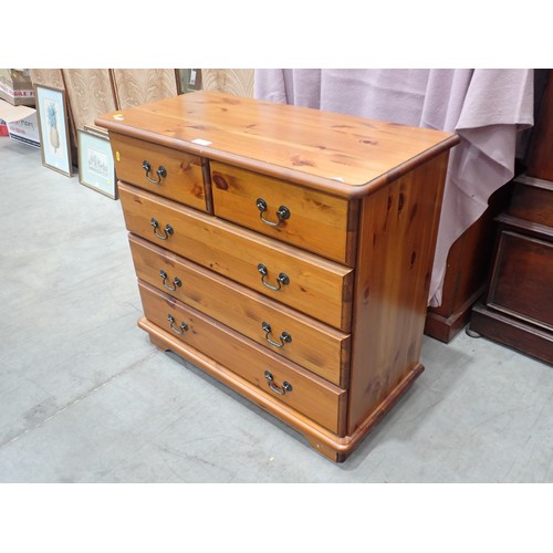 301 - A modern pine Chest of two short and three long drawers