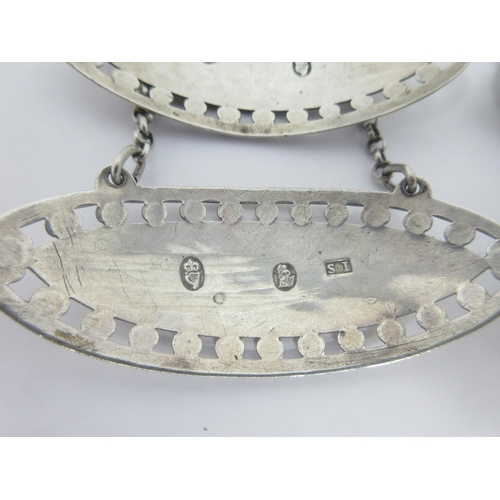 1 - A set of four Irish silver oval Labels, Hock, Port, Sherry and Claret with pierced bright cut border... 