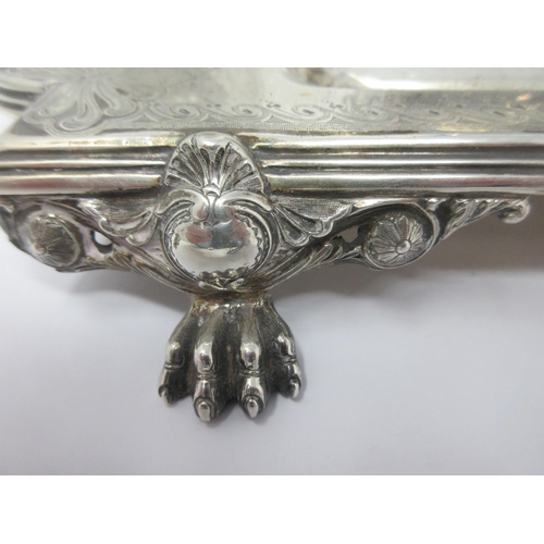 109 - A Victorian silver Inkstand of shaped rectangular form fitted pair of silver lidded cut glass Inkwel... 