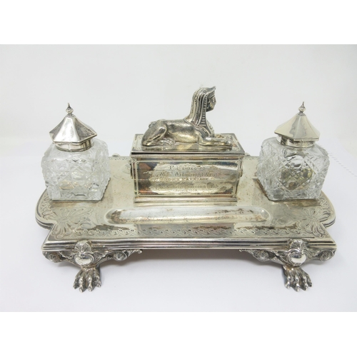 109 - A Victorian silver Inkstand of shaped rectangular form fitted pair of silver lidded cut glass Inkwel... 