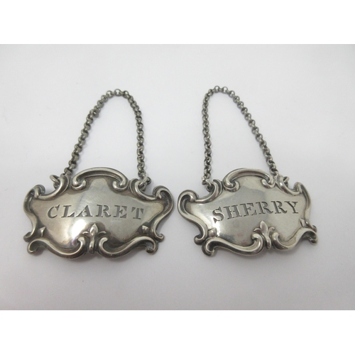 15 - A pair of Victorian silver escutcheon Labels, Sherry and Claret, London 1842, maker: Edward and John... 