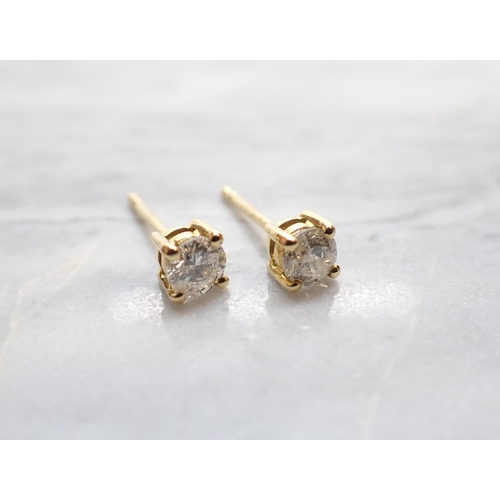 241 - A pair of Diamond Ear Studs each claw-set brilliant-cut stone in 18ct gold, total diamond weight 0.4... 