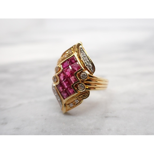 260 - A Ruby and Diamond Cocktail Ring invisibly-set a cluster of ten step-cut rubies within lozenge shape... 