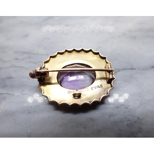 262 - An Amethyst Brooch claw-set oval-cut stone within beaded and scalloped frame in 9ct gold, approx 28m... 