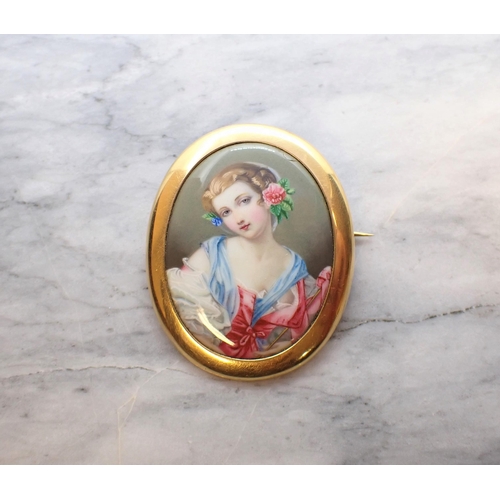 267 - A Portrait Miniature Brooch with painted enamel of young girl in blue and pink dress in 18ct gold fr... 