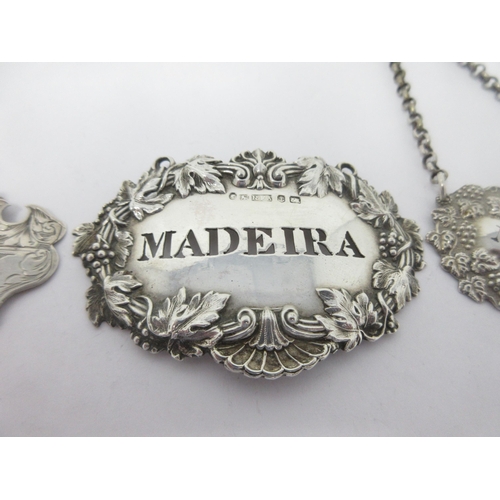 27 - A Victorian silver escutcheon Label, Sherry, Birmingham 1846, maker: George Unite, a Madeira Label, ... 