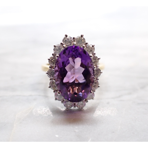 281 - An Amethyst and Diamond Cluster Ring claw-set oval-cut amethyst, 3cts, within a frame of fourteen br... 