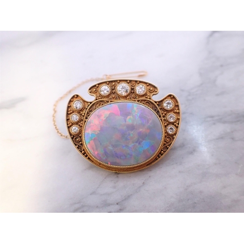 286 - A mid 20th Century Opal and Diamond Brooch millegrain-set oval opal within graduated brilliant-cut d... 