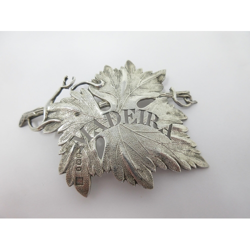 3 - A George IV silver Madeira Label in the form of a vine leaf, London 1828, maker: Charles Rawlings an... 